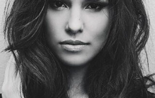 White Hair at Young Age - Psychological Treatment - a girl is posing for pic...her white hairs are clearly visible among black hairs